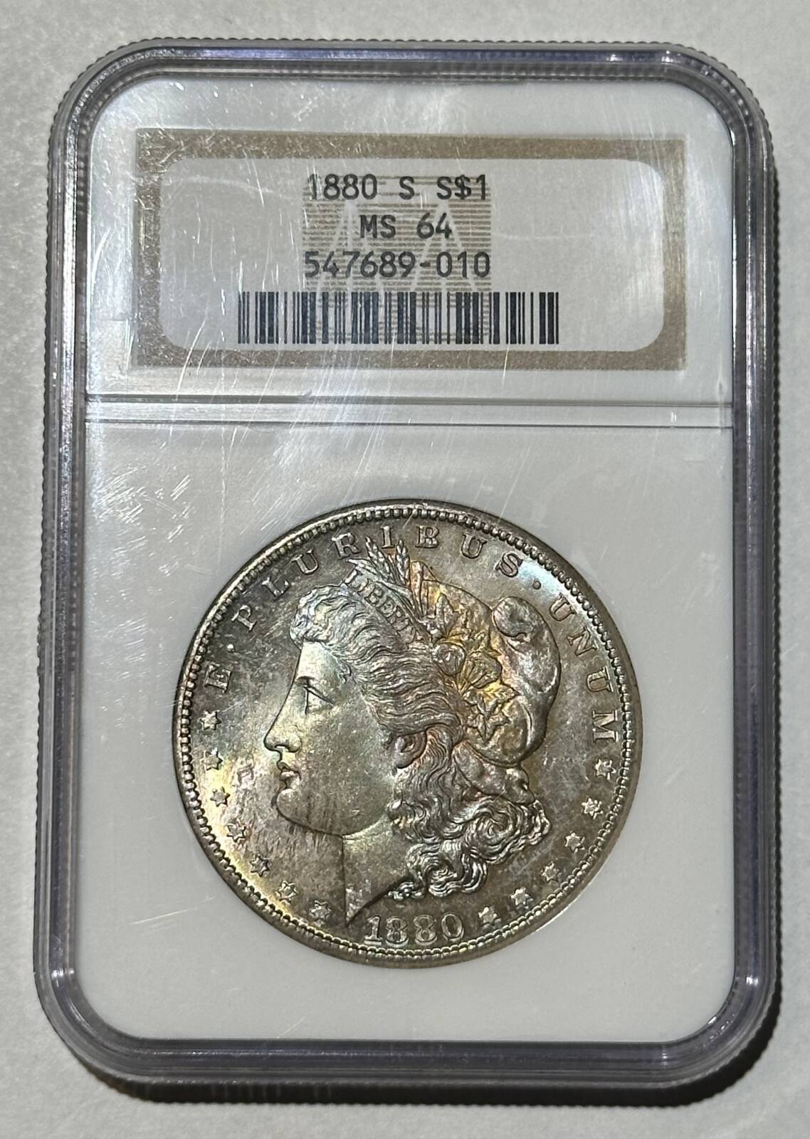 1880 S Morgan Silver Dollar NGC MS-64 Rainbow Toning